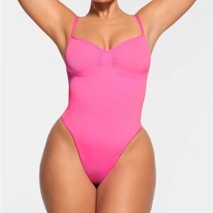 Skims NEW seamless sculpt brief bodysuit limited edition Pink Size SMALL